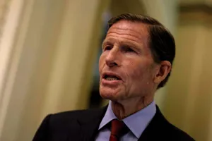 Senator Richard Blumenthal Against A Yellow Backdrop Wallpaper
