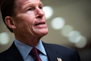 Senator Richard Blumenthal Delivering A Speech Against A Backdrop Of Bokeh Lights Wallpaper