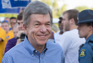 Senator Roy Blunt Flaunting His Warm Smile Outdoors Wallpaper