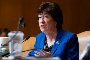 Senator Susan Collins In Blue Suit Wallpaper