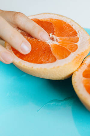 Sensual Touch With Grapefruit Wallpaper