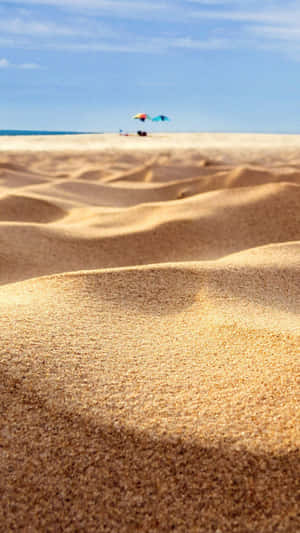 Serene And Peaceful Beach Sandscape Wallpaper