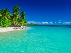 Serene And Relaxing Sunset On Fiji Beach Wallpaper