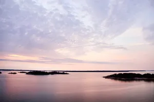 Serene Archipelago Sunset Wallpaper