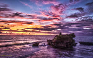 Serene Bali Beach At Sunset Wallpaper