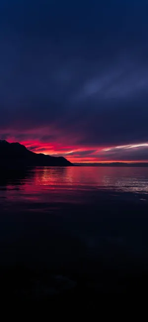 Serene Beach At Sunset Wallpaper