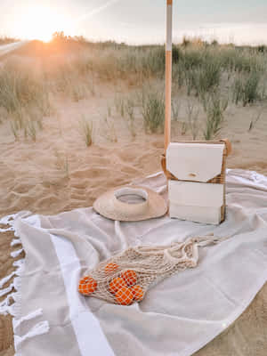 Serene Beach Picnic With A View Wallpaper