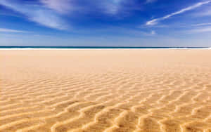 Serene Beach Sand Landscape Wallpaper