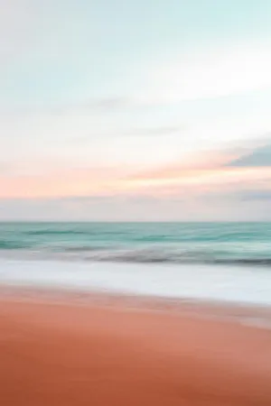 Serene Beach Sunset Blur Wallpaper