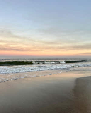 Serene Beach Sunset Wallpaper
