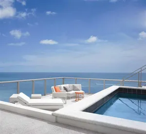 Serene Beach Swimming Pool Oasis Wallpaper