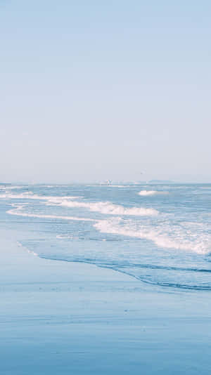 Serene Blue Beach Waves Wallpaper