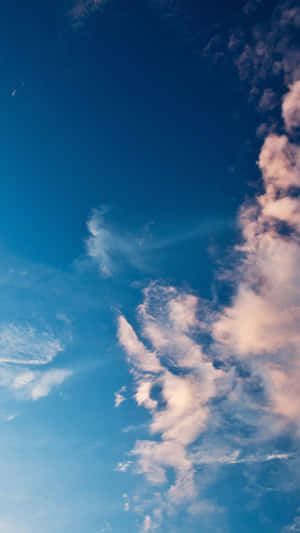 Serene_ Blue_ Sky_with_ Clouds.jpg Wallpaper