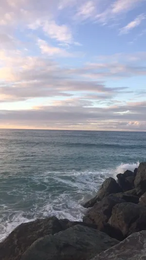 Serene Coastal Sunset Wallpaper