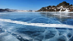 Serene Frozen Lake Landscape Wallpaper