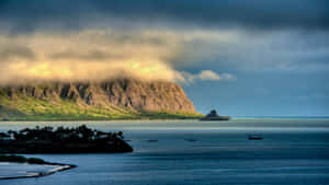 Serene Hawaiian Beach At Sunset Wallpaper