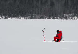 Serene Ice Fishing Excursion Wallpaper