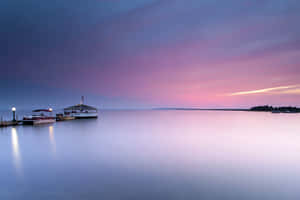 Serene Lake Dusk Pier Wallpaper