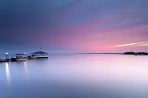 Serene Lake Dusk Pier Wallpaper