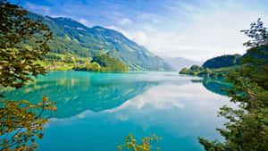 Serene_ Lake_ Mountain_ View.jpg Wallpaper