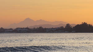 Serene Landscape - Sea And Mountains Wallpaper