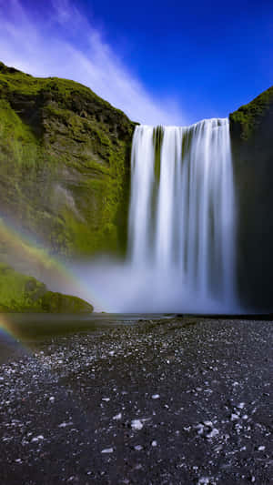 Serene Moment Overlooking An Iphone Waterfall Wallpaper