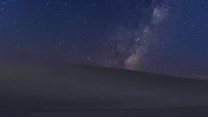 Serene Night Sky Illuminated By Dazzling Stars Wallpaper