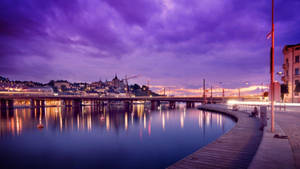 Serene Night View Of Stockholm Waterfront - The Venice Of The North Wallpaper