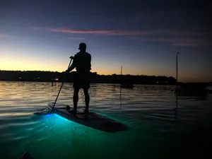 Serene Paddleboard Adventure Wallpaper