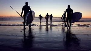 Serene Paddleboarder At Sunset Wallpaper