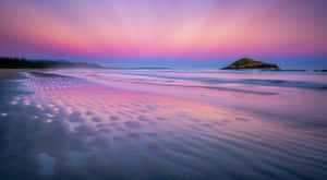 Serene Pink Sand Beach Escape Wallpaper