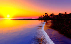 Serene Seashore At Sunset Wallpaper