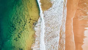 Serene Sunset At The Beach Wallpaper