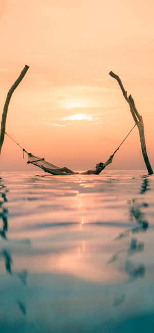 Serene Sunset Hammock Waterfront.jpg Wallpaper