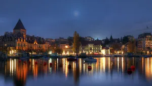 Serene Sunset Over The Picturesque City Of Lausanne, Switzerland Wallpaper
