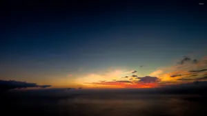 Serene Sunset Sky Landscape Wallpaper