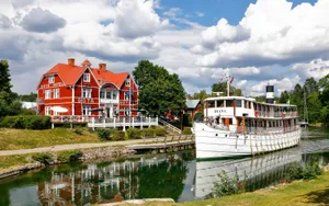 Serene Sunset View Over Norrköping Wallpaper