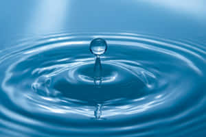 Serene Water Drop Moment.jpg Wallpaper