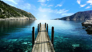 Serene Waterfront Pier Wallpaper Wallpaper