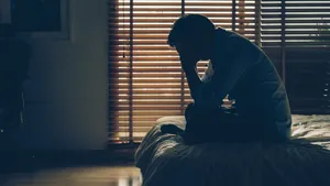 Serene Woman In Contemplation Amidst Nature Wallpaper