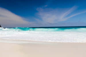 Serenity Beach Waves Blue Sky Wallpaper