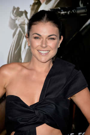 Serinda Swan Smiling Black Dress Event Wallpaper