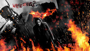 Serious Joker On A Burning Place Wallpaper