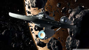 Set To Explore The Unknown Depths Of Space - The Starship Enterprise Wallpaper