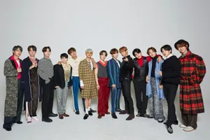 Seventeen Band Posing For A Magazine Shoot Wallpaper