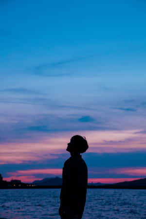 Shadow Pfp Of Boy By The Beach Wallpaper