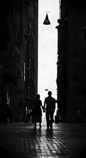 Shadowed Lovers Walk Wallpaper
