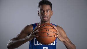 Shai Gilgeous Alexander Basketball Player Pose La Clippers Wallpaper