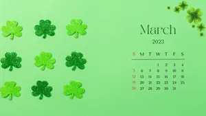 Shamrocks On A Green Background With A Calendar Wallpaper