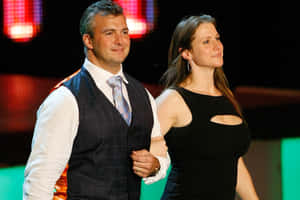 Shane Mcmahon Arm And Arm With Stephanie Mcmahon Wallpaper